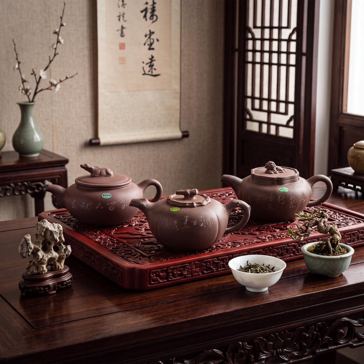 Three dark brown zisha clay teapots with rounded bodies and lids, each featuring a small sculpted animal figure on top. The teapots are decorated with engraved Chinese characters and are arranged on a rectangular carved wooden tray.