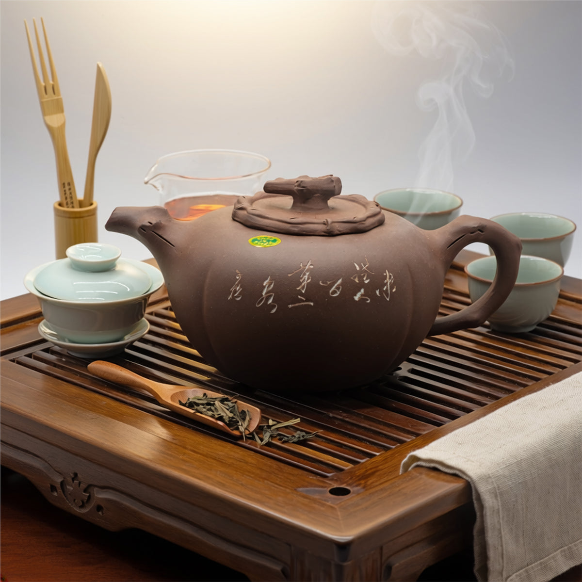 Vintage Factory 1 Yixing Zisha clay pine branch teapot arranged on a traditional carved wooden tea tray during a classical Gongfu tea ceremony service.